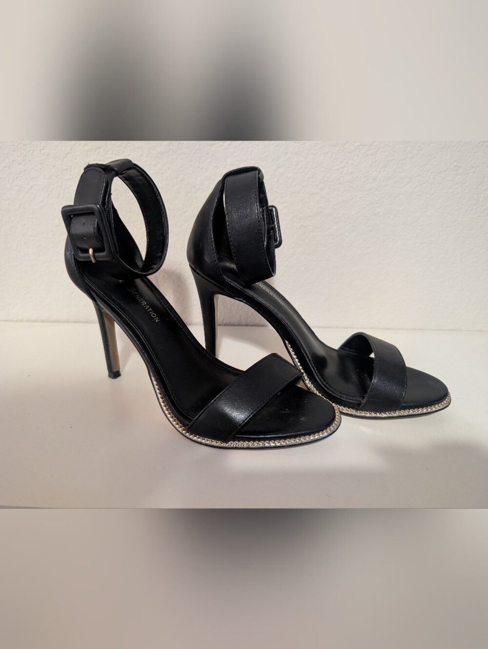BCBGeneration Black Ankle-Strap Stiletto Sandals with Rhinestone Trim